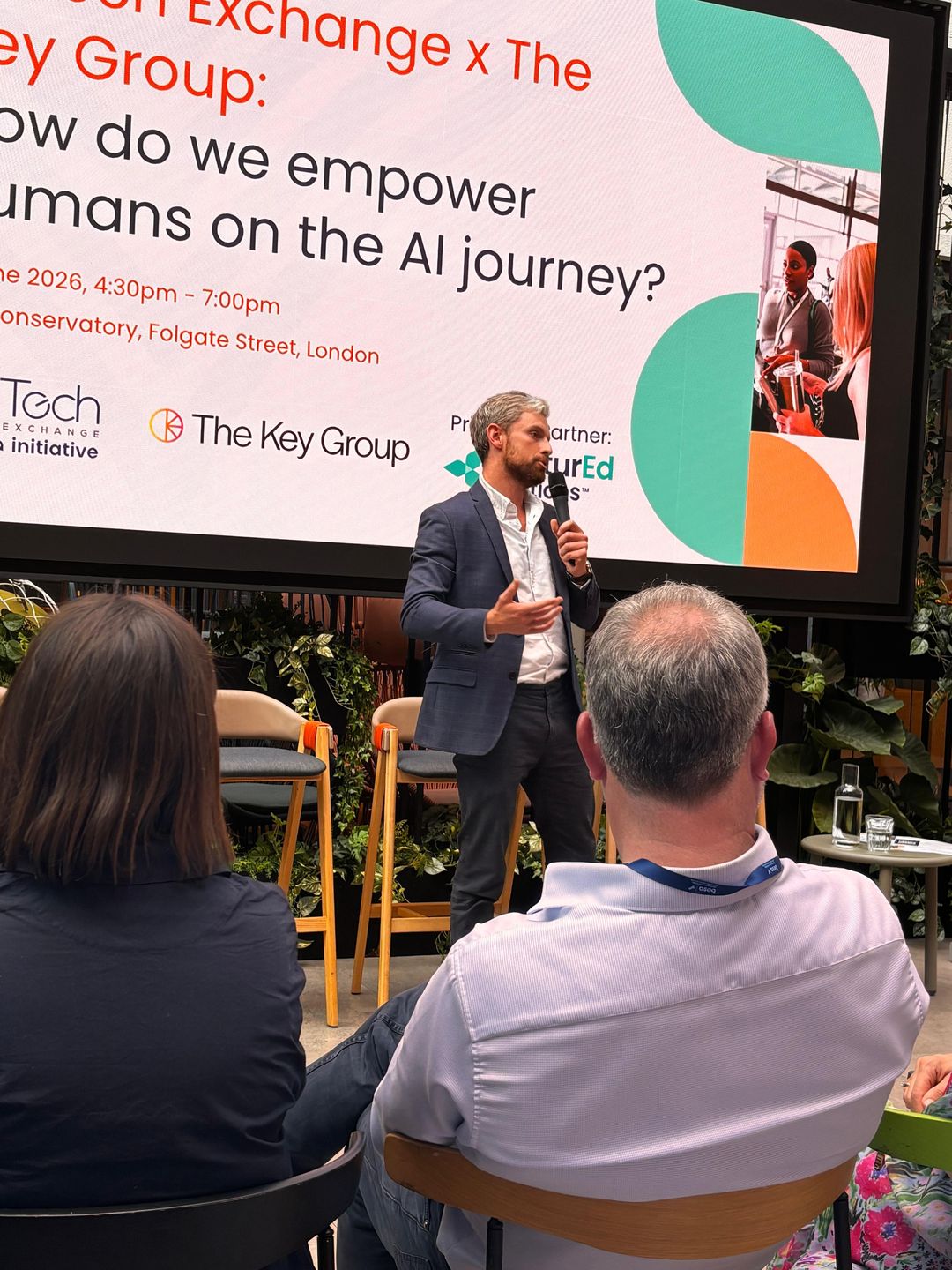 Harri Davies speaking at a Tech Exchange event in London.